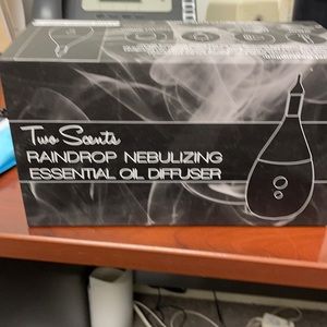 New in box:  essential oil diffuser